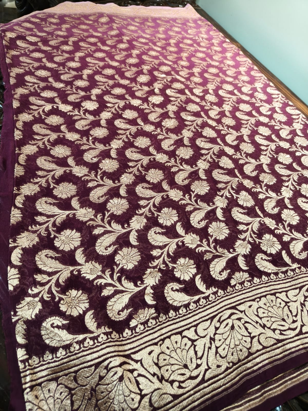 Pure silk wine colour saree in sheer and breathable silk completely hand weaved and pure zari