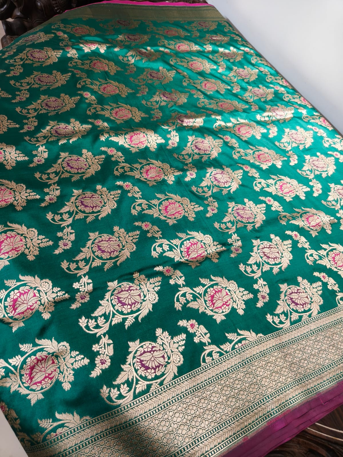 Pure Mulberry silk green with golden and silver zari work throughout the saree. 100% pure silk with pure zari completely hand woven