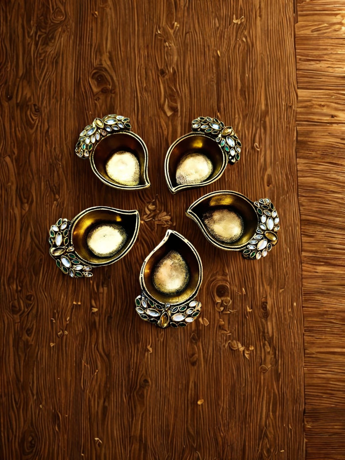 Leaf design diyas in pure casted brass ( pair )