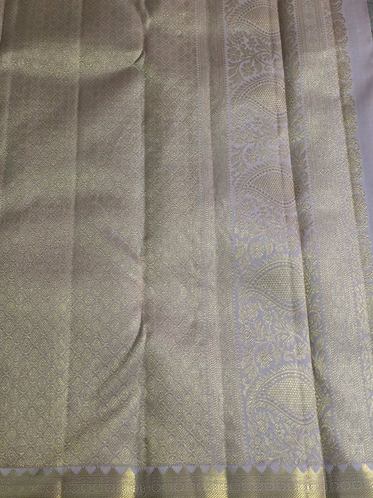 Pure Mulberry silk saree light grey and gilden colour with pure zari completely hand woven.